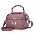 Vintage mauve faux leather crossbody handbag with multiple zipper pockets and top handle - Purple