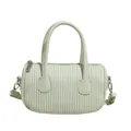 Sage green quilted barrel bag in pebble leather with top handles and shoulder strap - Green