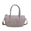 Minimalist light grey cylinder bag with pleated texture and adjustable strap - Gray