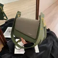 Minimalist dark green shoulder bag in faux leather and twill fabric with gold logo detail - Green