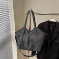Dark grey large matte PU tote bag with adjustable shoulder straps and pleated texture - Black