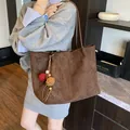 Minimalist large brown tote bag with colorful pompom charm for casual daily commuting - Brown