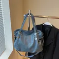 Large capacity navy blue soft leather tote bag with silver studs and crossbody strap - Lake Blue