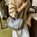 Borsa a cilindro in denim blu retrò con tracolle in pelle marrone per viaggio - Blu