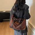 Große braune Wildleder-Tragetasche mit Ledergriffen im professionellen Pendler-Stil - Kaffeebraun