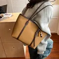 Khaki brown large capacity tote bag with dark brown trim and bohemian beaded charm - Yellow Brown