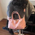 Bolso grande rosa retro de cuero sintético texturizado con correa ancha de hombro - Rosa