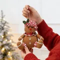 Handcrafted knitted gingerbread man ornament with red plaid hat for Christmas tree decor - Female Gingerbread Man Doll (Patterned Hat)