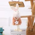 Coniglietto pasquale di peluche con gonna arancione e fiocco rosa per decorazioni - Ciondolo Coniglio Rosa / Rosa