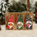 Three hand-painted Christmas gnome wooden ornaments in a rustic storage box with red beads - Style B
