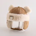 Detail of winter trapper hat for kids featuring plush bear ears and warm fleece lining - Toddlers 1-3 Years / Light Coffee