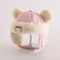 Detail of winter trapper hat with fleece lining, faux fur trim and bear ear pom-poms - Toddlers 1-3 Years / Pink