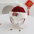 Close-up of baby winter earflap hat with velvet fabric, white fur trim and plush pompom - Baby 2-5 Years Old / Candy Snowflake Style