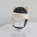 Detail of leopard print winter hat with plush faux fur trim and adjustable chin strap - Baby 2-5 Years Old / Double Pom-pom Dark Gray