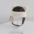 Detailed view of leopard print baby winter hat with plush white faux fur lining and pom-poms - Baby 2-5 Years Old / Double Pom Poms Dark Brown