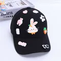 Close-up of black baseball cap with cute rabbit and flower silicone patches for kids - One Size (48-56CM) / Black