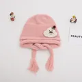 Pink knitted baby winter hat with cartoon bear patch and long braided tassel straps - Baby One Size Elastic / Cloud Pink