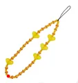 Detail of colorful beads, yellow heart pendant, and striped accents on a phone lanyard - Orange