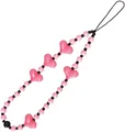 Macro shot of pink heart beads and striped resin balls on a stylish phone charm strap - Pink