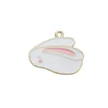 Macro detail of white enamel rabbit charm with gold metal edges for DIY jewelry making - Left Facing Rabbit