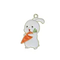Detailed close-up of rabbit alloy pendant with orange carrot and gold metal edges - Carrot Rabbit