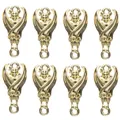 Detailed close-up of eight gold-plated alloy bat charms for DIY jewelry making - Gold
