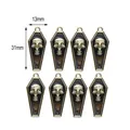 Set de 8 colgantes de ataúd con calavera en bronce y negro para creación de joyas DIY - Base Dorada Estilo Calavera Marrón
