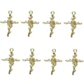 Détail macro de huit pendentifs croix de rose en alliage doré pour bijoux DIY - Or