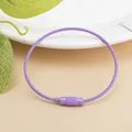 Detail view of purple coated steel wire keychain ring with secure screw lock mechanism - Purple