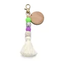 Detail of boho keychain with silicone beads, crochet ball, and long white cotton tassel - Green Purple Tassel Style