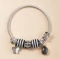 Zilveren kralenarmband met vlinder, gestreepte kralen en zwarte druppelvormige hanger - Zwart en Wit Vlinder Strass Paraplu Fiets Bedel Stijl