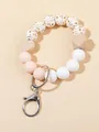 Llavero de pulsera con cuentas rosas y blancas, silicona floral y colgante de corazón - Blanco Floral Hojas