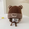Close-up of brown baby winter knit hat with earflaps, stripes, and cute ear details - 3-6 Years / HELLO Series / Dark Coffee