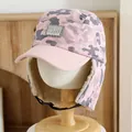 Dettaglio cappello invernale mimetico rosa con fodera in pile e toppa NYC - Modello universale per bambini / Rosa
