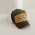 Detail of multi-color fleece winter trapper hat for kids with soft plush earflaps and embroidery - Olive Green, Ginger & Dark Brown Colorblock Style (Style 1)