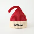 Detail showing the red and white knit texture and Unice embroidery on children hat - Red Patchwork Beige