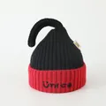 Detail showing the red embroidered NICE logo and smile face on black knit hat - Black/Red