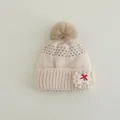 Detail of knit baby beanie with large faux fur pom-pom and lace cherry patch - Kids 3-8 Years (Elastic) / Beige Pom Pom