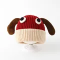 Detail of baby knitted hat with long ears and cute puppy design on a white stand - Toddler (1-3 Years) / Burgundy