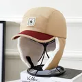 Detail of khaki aviator hat with burgundy visor, warm fleece lining and buckle strap - Kids 5-12 Years / Khaki