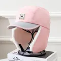 Detail of pink winter trapper hat with G-patch, earflaps and warm faux lamb wool lining - Kids 5-12 Years / Pink