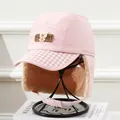 Detail of pink winter trapper hat with fleece lining and bear emblem for children - Kids (5-12 Years) / Pink