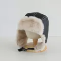 Black faux leather winter trapper hat with warm beige plush lining and chin strap buckle - Kids approx 3-10 years / Black