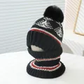 Detail of children's thick knitted hat and neck warmer set in black with white geometric patterns - Kids Ages 3-8 Stretchy / Black