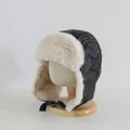 Winterse pilotenmuts van zwart imitatieleer met pluche voering en stikselster - Kinderen ca. 3-10 jaar / Zwart