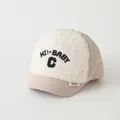 Beige and white BOSTON baby baseball cap with plush front and quilted brim detail - 48-52cm / HI! BABY C Khaki (C Letter Khaki)