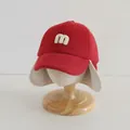 Red winter baby baseball cap with ear flaps and white letter m embroidery detail - Kids 2-6 Years / M Logo Wine Red