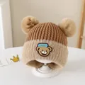 Brown and beige knitted kids winter hat with fluffy pompoms and lucky bear patch - Style 4 Coffee