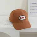 Braune Baseballkappe für Kinder aus Baumwolle mit KYM-Stickerei auf der Vorderseite - Universalmodell für Kinder / Kaffeebraun