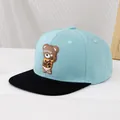 Detailed side view of a blue and black baseball cap featuring a 3D bear candy patch - 50-54cm (3-10 Years) / Sky Blue and Black
